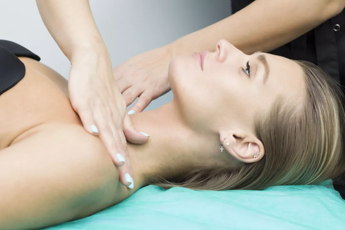girl-gets-massage-neck-decollete-area