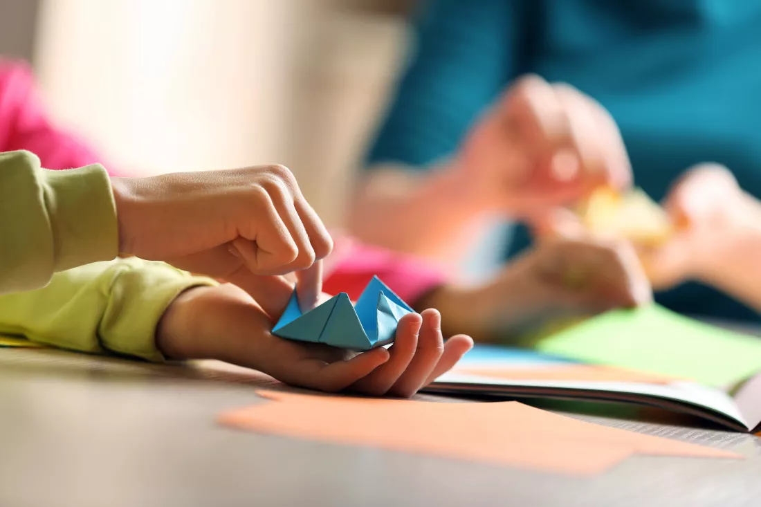 children-making-swan-with-coloured-paper