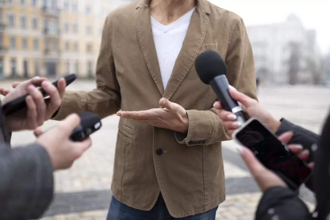 close-up-reporter-preparing-interview
